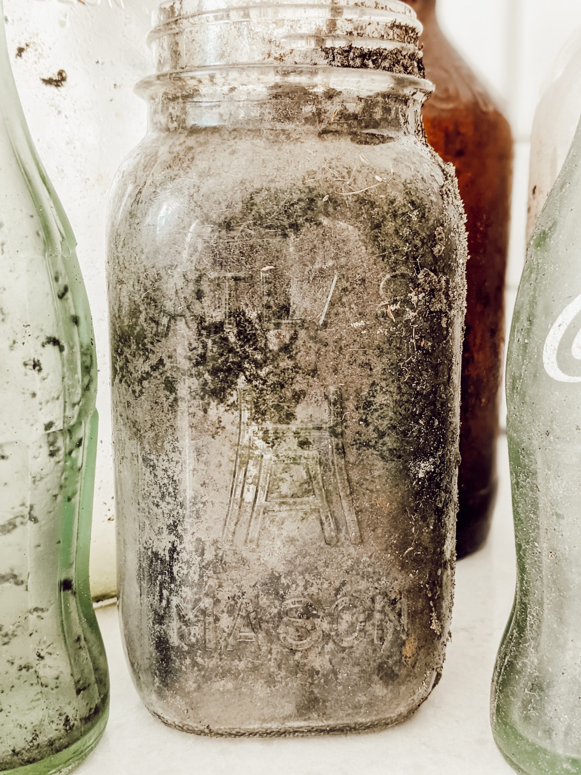 how to clean a glass jar like this dirty antique atlas mason jar