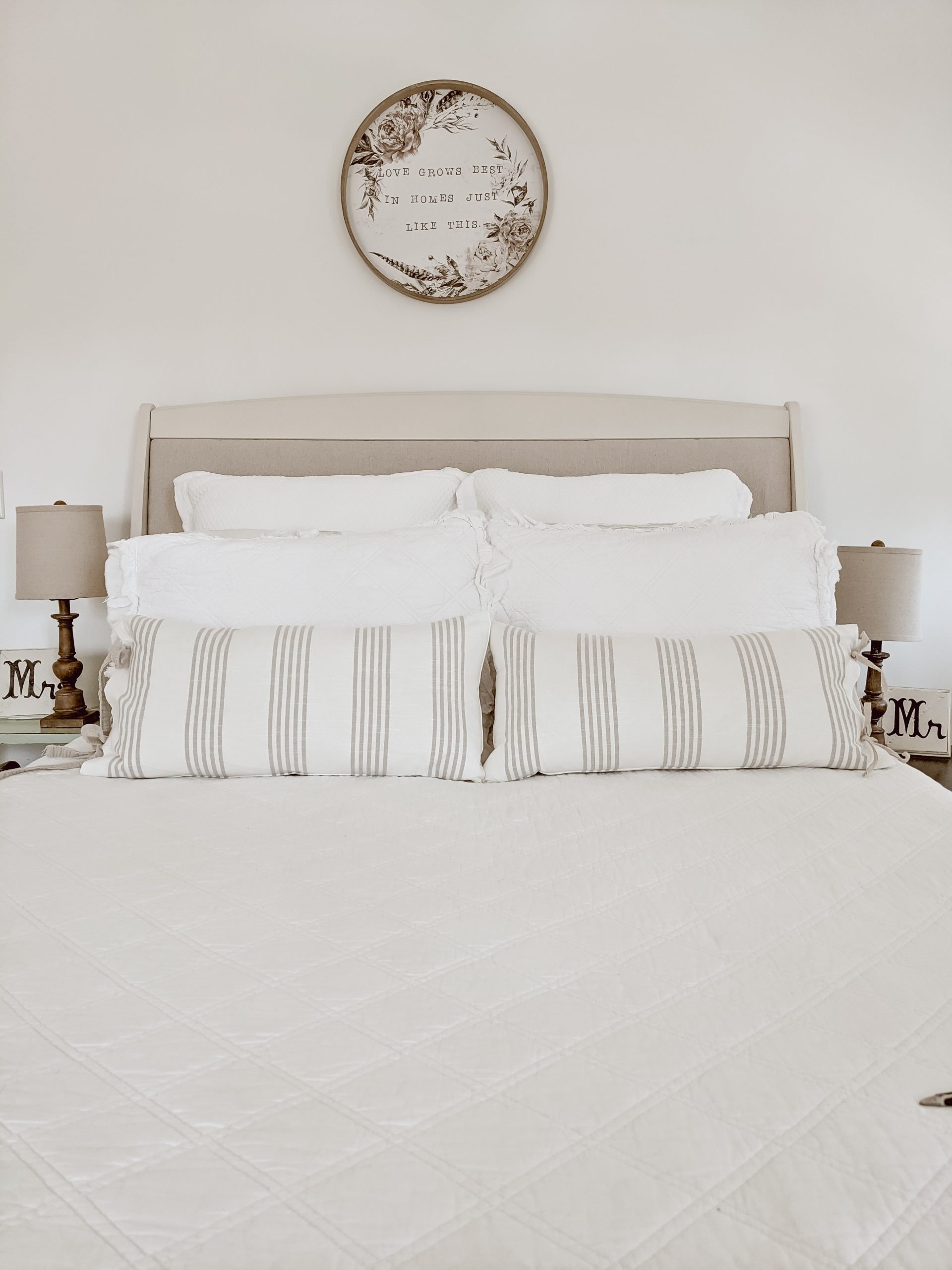 white and neutral toned french farmhouse bedding with DIY pillow covers