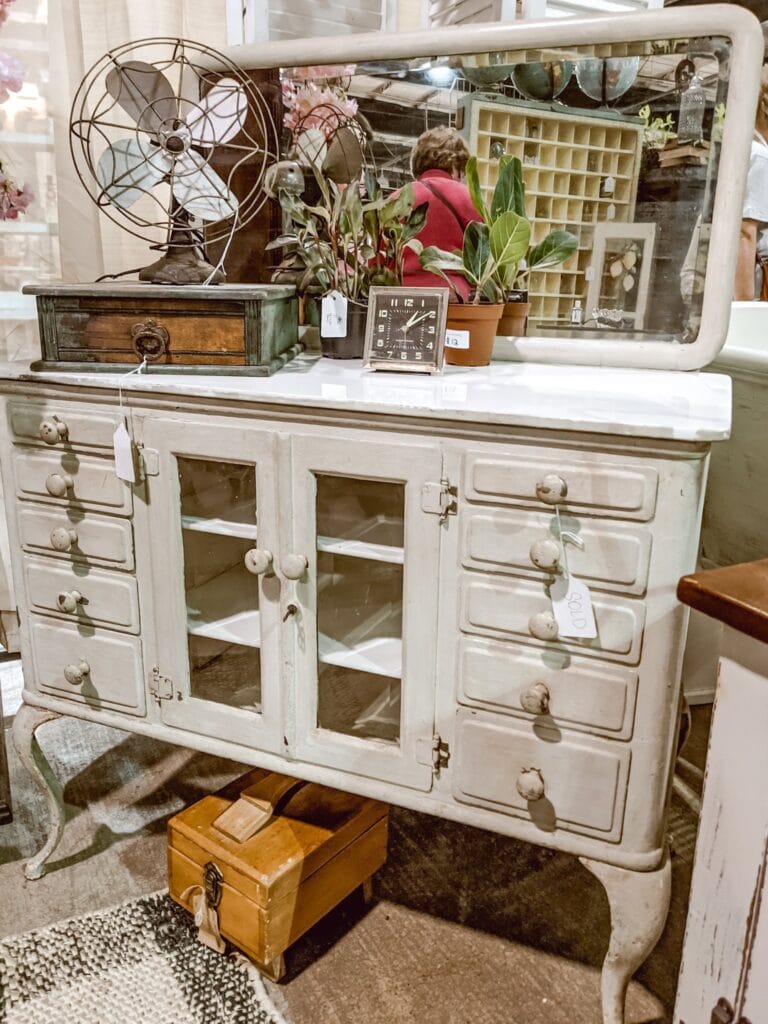 beautiful dresser with glass doors at vintage market days