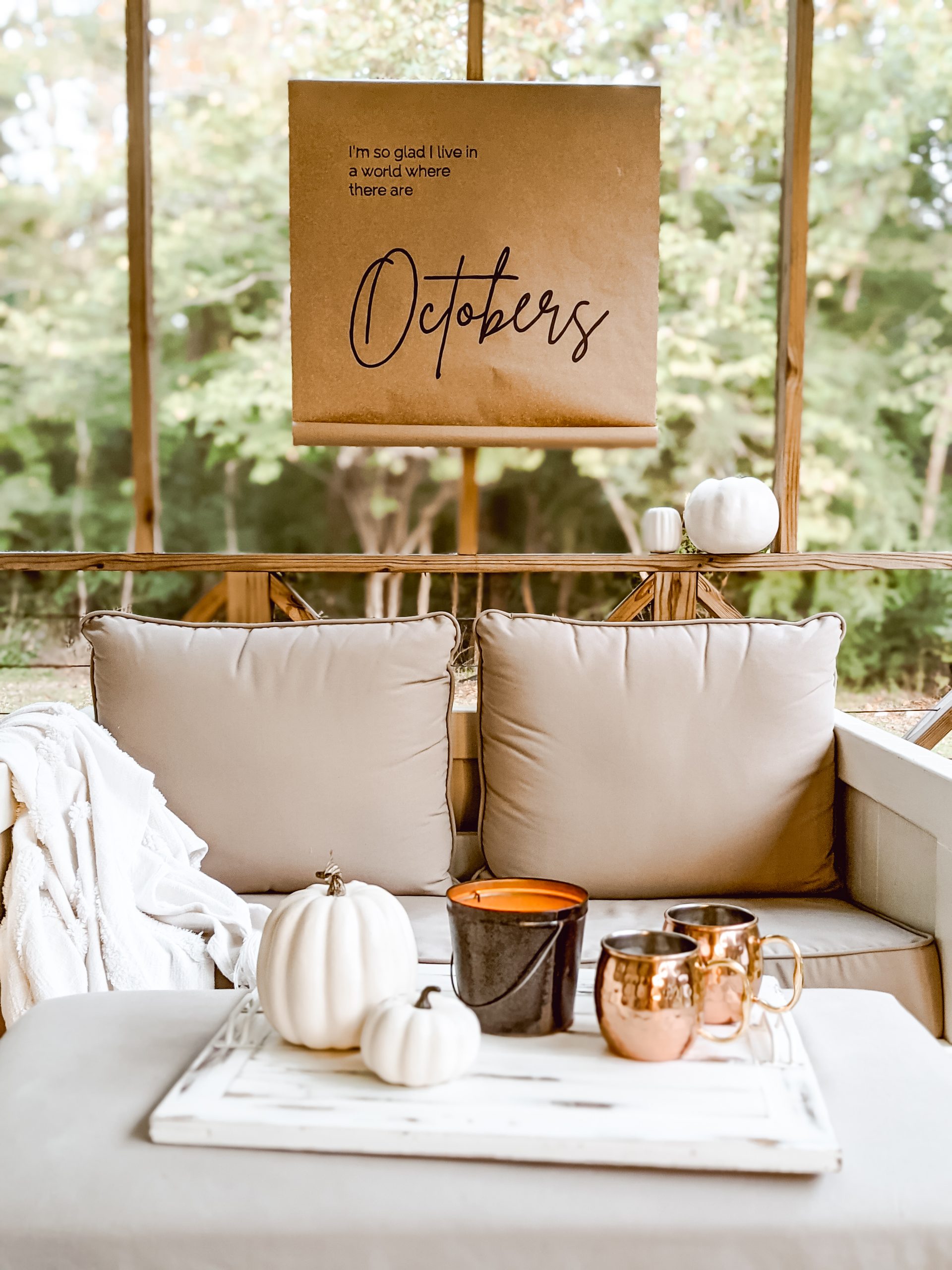 outdoor living area decorated for fall