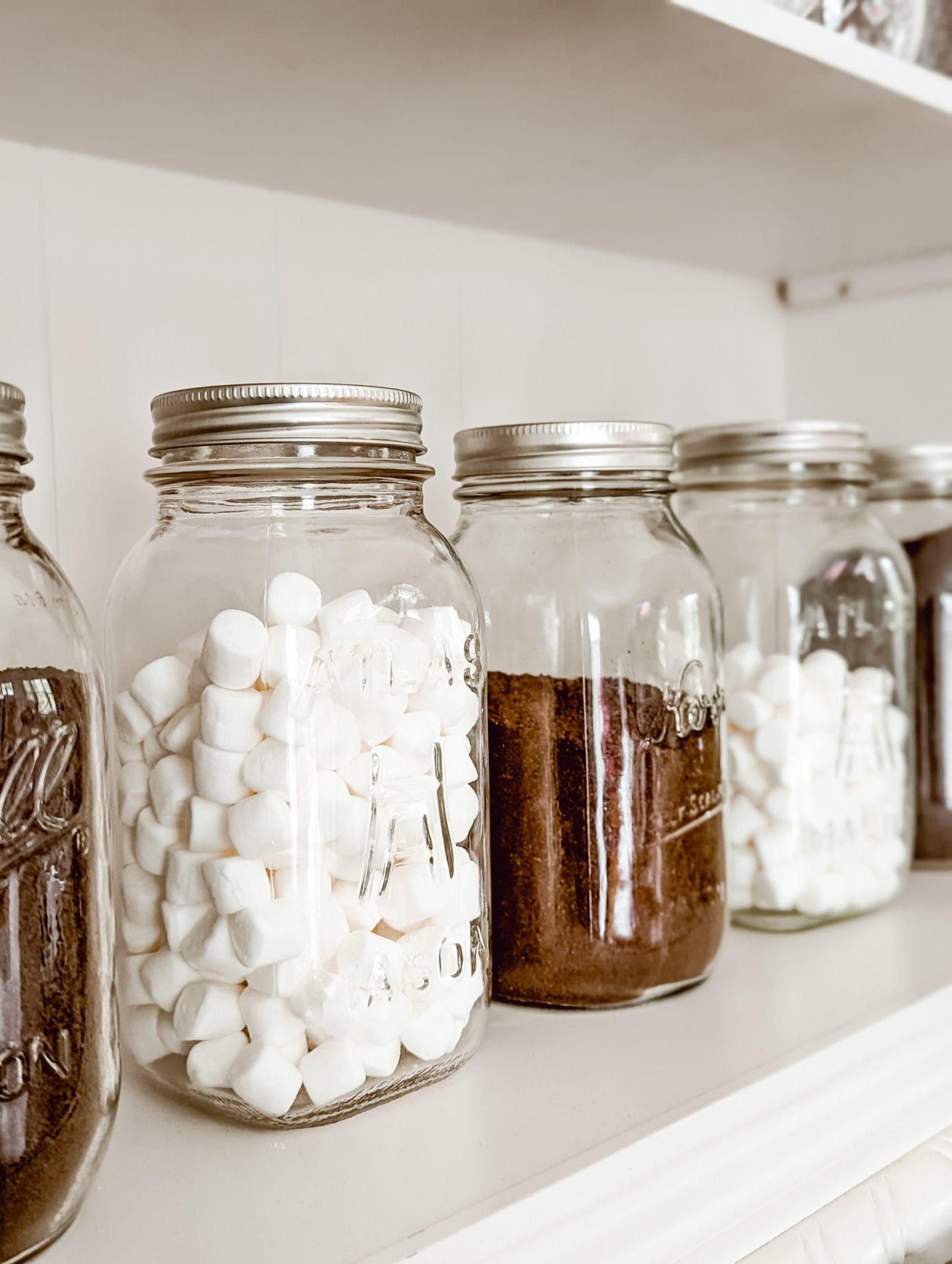 reuse glass mason jars in coffee bar as storage for coffee beans, ground coffee, and marshmallows