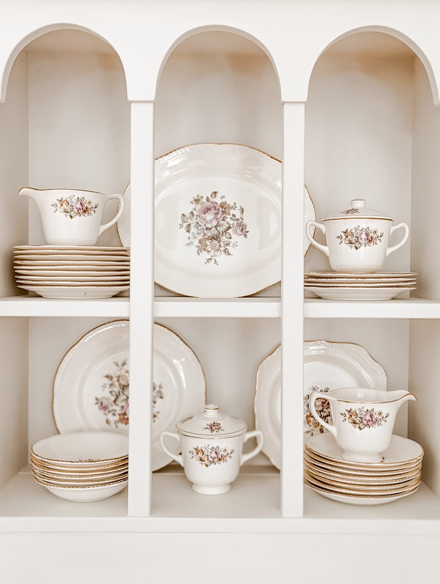 vintage china collection with roses and gold rim